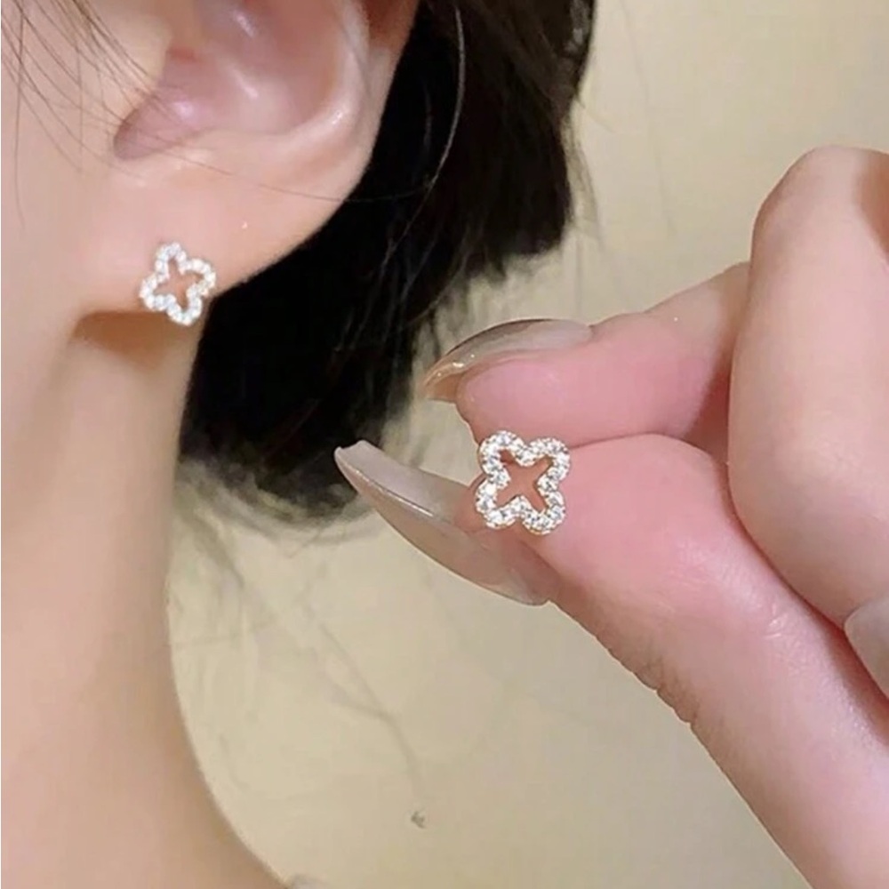 Gold Floral Stud Earrings with Sparkling Gemstone